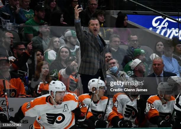 Alain Vigneault of the Philadelphia Flyers calls from the bench against the Dallas Stars at the American Airlines Center on November 13, 2021 in...