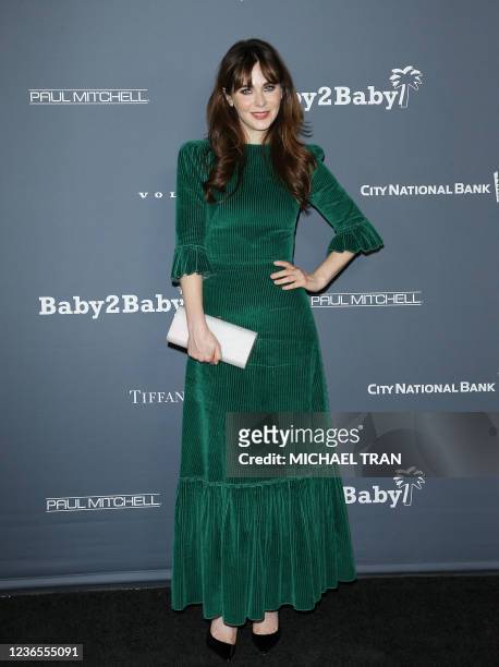 Actress Zooey Deschanel attends the Baby2Baby 10-Year Gala Presented By Paul Mitchell at the Pacific Design Center on November 13, 2021 in West...