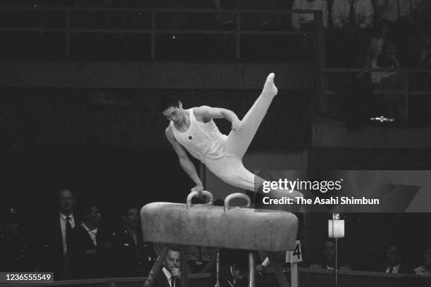 Sawao Kato of Japan competes in the Pommel Horse of the Artistic Gymnastics Men's Team Compulsory during the Mexico City Summer Olympic Games at the...