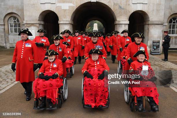 Veterans from the Chelsea Pensioners walk in procession from Horse Guards Parade as they attend the Remembrance Sunday ceremony at the Cenotaph on...