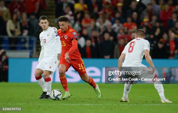 Wales Ethan Ampadu battles with Belarus's Andrei Solovei during the 2022 FIFA World Cup Qualifier match between Wales and Belarus at Cardiff City...