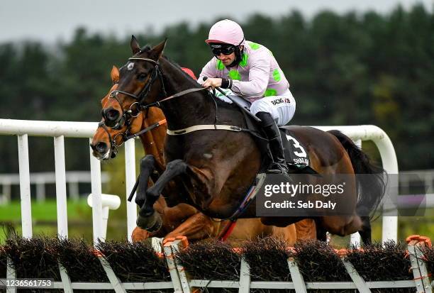 Kildare , Ireland - 14 November 2021; Sharjah, with Patrick Mullins up, jumps the last on their way to winning the Unibet Morgiana Hurdle during day...