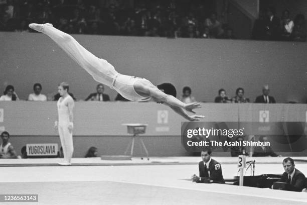 Sawao Kato of Japan competes in the Floor of the Artistic Gymnastics Men's Individual All-Around final during the Mexico City Summer Olympic Games at...