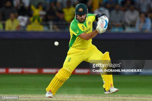 Australia's captain Aaron Finch plays a shot during the ICC mens Twenty20 World Cup final match between Australia and New Zealand at the Dubai...