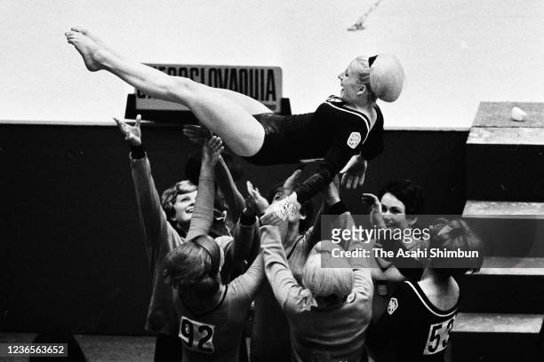 Gold medalist Vera Caslavska of Czechoslovakia is tossed into the air after winning the gold medal in the Artistic Gymnastics Women's Individual...