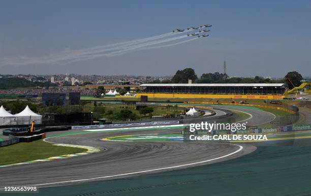 Aircrafts perform a display before Brazil's Formula One Sao Paulo Grand Prix at the Autodromo Jose Carlos Pace, or Interlagos racetrack, in Sao...
