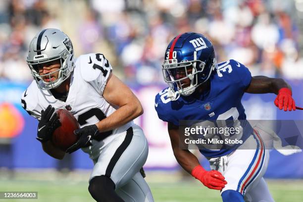 Hunter Renfrow of the Las Vegas Raiders in action against Darnay Holmes of the New York Giants at MetLife Stadium on November 07, 2021 in East...