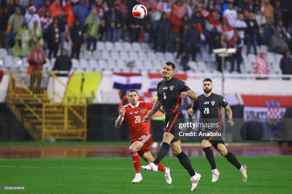 Croatian Vs. Russian Dejan Lovren of Croatia in action against Aleksey Ionov of Russia ...