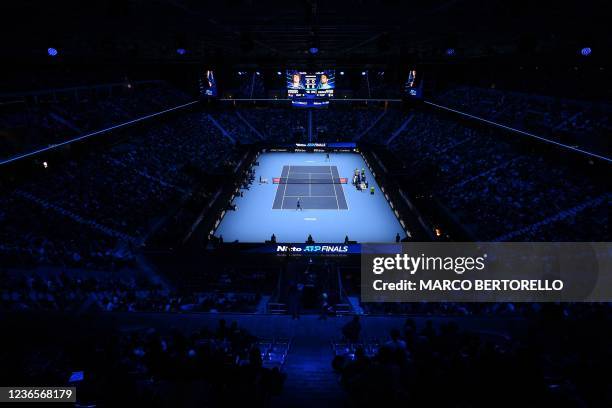 Italy's Matteo Berrettini serves to German's Alexander Zverev during their first round singles match at the ATP Finals at the Pala Alpitour venue in...