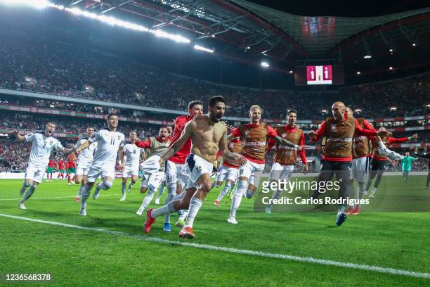 Aleksandar Mitrovic of Serbia celebrates scoring Serbia second and wining goal during the 2022 FIFA World Cup Qualifier match between Portugal and...