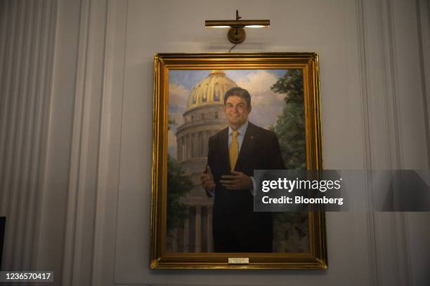 Painted portrait of Senator Joe Manchin, a Democrat from West Virginia, hangs in the State Capitol building in Charleston, West Virginia, U.S., on...