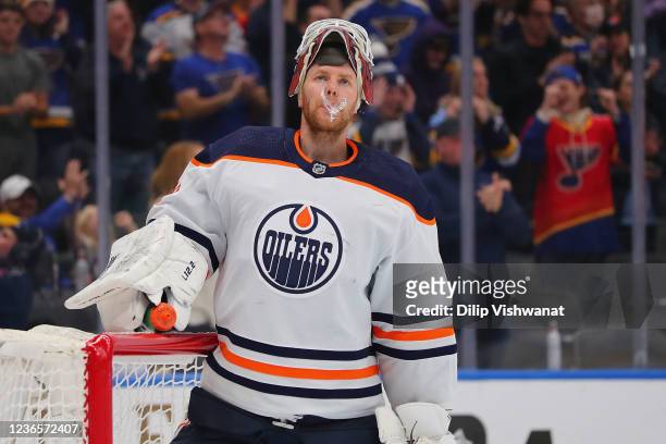 Mikko Koskinen of the Edmonton Oilers reacts after allowing a game-tying goal against the St. Louis Blues during the third period at Enterprise...
