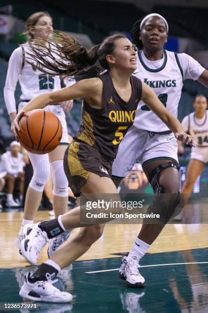 Quincy Hawks guard Beth Matas Martin with the basketball during the second quarter of the women's college basketball game between the Quincy Eagles...