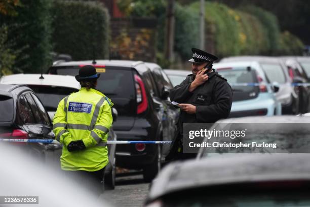 Police officers seen outside a premises in Rutland Avenue on November 15, 2021 in Liverpool, England. A man was killed when the taxi in which he was...