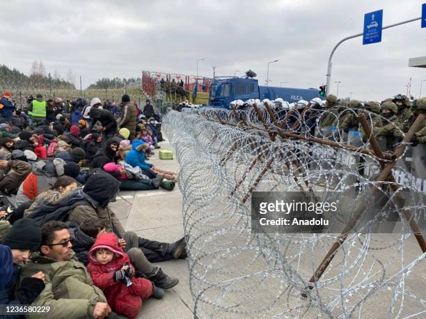 Irregular migrants with new irregular migrant groups are seen following their arrival at the border line and they continue to wait at the...