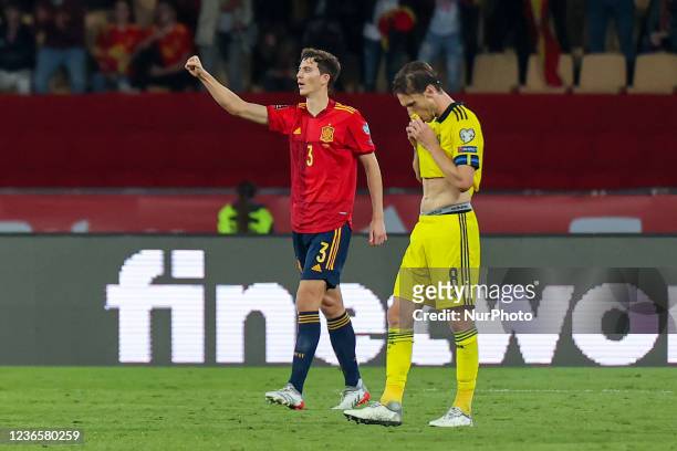 Pau Torres of Spain celebrate winning during the FIFA World Cup Qatar 2022 qualification football match between Spain and Sweden at the Cartuja...
