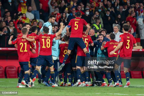 Players of Spain celebrate a goal during the FIFA World Cup Qatar 2022 qualification football match between Spain and Sweden at the Cartuja stadium...