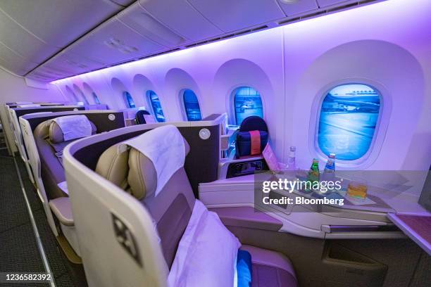 Seats for business class passengers aboard a Boeing 787-10 passenger aircraft, operated by Saudia Airlines, at the 17th Dubai Air Show in Dubai,...