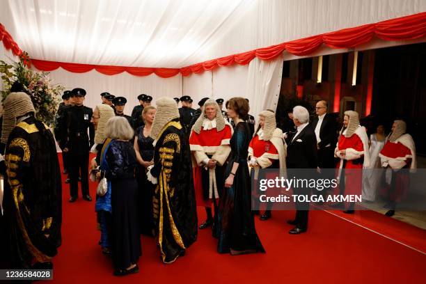Judges and their partners arrive to attend the Lord Mayor's Banquet in central London on November 15, 2021. - The Lord Mayor's Banquet is held in...