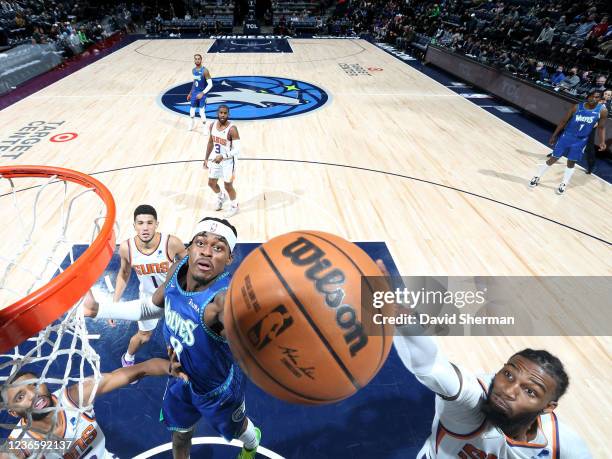 Jarred Vanderbilt of the Minnesota Timberwolves grabs the rebound against the Phoenix Suns on November 15, 2021 at Target Center in Minneapolis,...