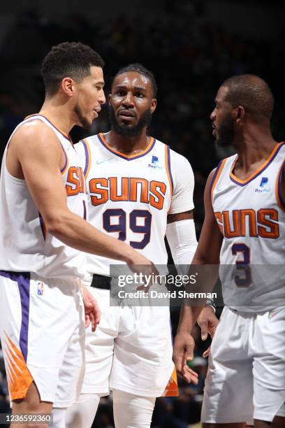 Devin Booker of the Phoenix Suns and Jae Crowder during the game against the Minnesota Timberwolves on November 15, 2021 at Target Center in...