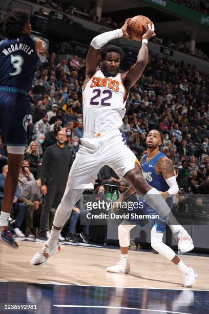 Deandre Ayton of the Phoenix Suns grabs the rebound against the Minnesota Timberwolves on November 15, 2021 at Target Center in Minneapolis,...