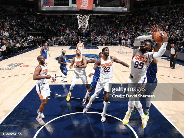 Jae Crowder of the Phoenix Suns drives to the basket against the Minnesota Timberwolves on November 15, 2021 at Target Center in Minneapolis,...