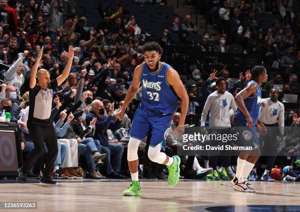 Karl-Anthony Towns of the Minnesota Timberwolves shows emotion during the game against the Phoenix Suns on November 15, 2021 at Target Center in...
