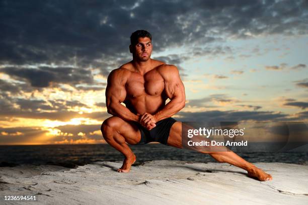 Chris Kavvalos poses during an early morning photo shoot at Little Bay on May 31, 2020 in Sydney, Australia. IFBB body builder Chris Kavvalos has...