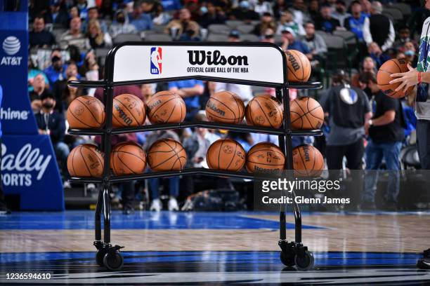 Ball rack sits on the court before the game between the Denver Nuggets and the Dallas Mavericks on November 15, 2021 at the American Airlines Center...