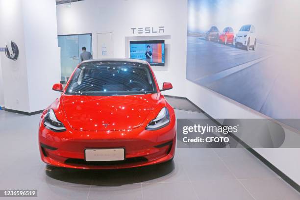 Model 3 and Model Y models are seen at a Tesla brand sales store in Shanghai, China, on April 2, 2021. Tesla's response to the lack of USB ports in...