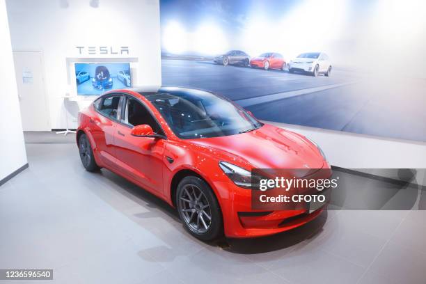 Model 3 and Model Y models are seen at a Tesla brand sales store in Shanghai, China, on April 2, 2021. Tesla's response to the lack of USB ports in...