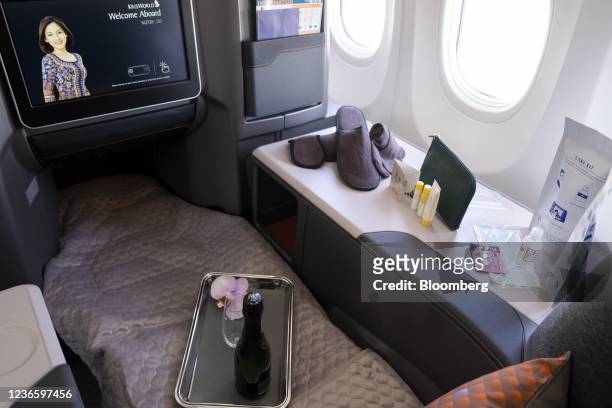Amenity kit items and champagne in the business class cabin of a Boeing Co. 737 Max 8 aircraft, operated by Singapore Airlines Ltd., during a media...