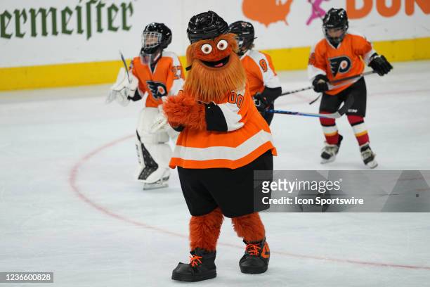 Philadelphia Flyers mascot Gritty performs during the Flyers Alumni Orange and Black game on November 15, 2021 at Wells Fargo Center in Philadelphia,...