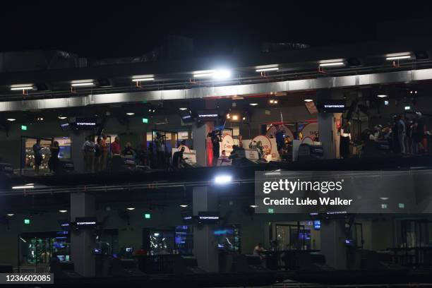 Min Woo Lee of Australia plays a shot during the Hero Challenge at Top Golf Dubai ahead of The DP World Tour Championship at Jumeirah Golf Estates on...