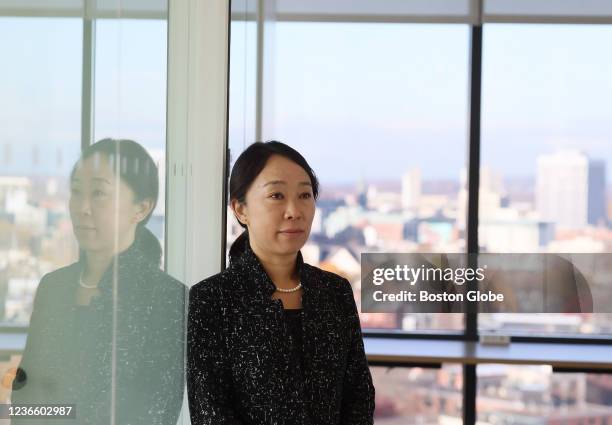 Cambridge, MA Dr. Xu Yu poses for a portrait inside her office in Cambridge, on November 15, 2021. Dr. Yu and her colleagues at the Ragon Institute...