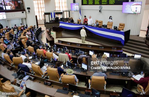 Nicaraguan congressmen participate in a parliamentary session where a letter was approved urging Nicaraguan President Daniel Ortega to disassociate...