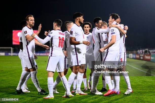 Harry Maguire of England celebrates with his teammates after scoring the opening goal during the 2022 FIFA World Cup European Qualifier football...