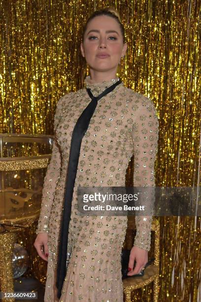 Amber Heard attends an after party celebrating the launch of "Alice's Archive" hosted by Alice Temperley and Annie Doble at The Groucho Club on...