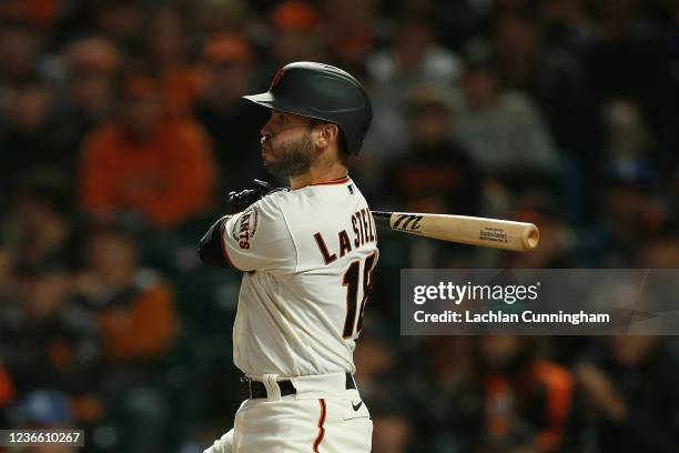 Tommy La Stella of the San Francisco Giants at bat during Game 1 of the NLDS between the Los Angeles Dodgers and the San Francisco Giants at Oracle...