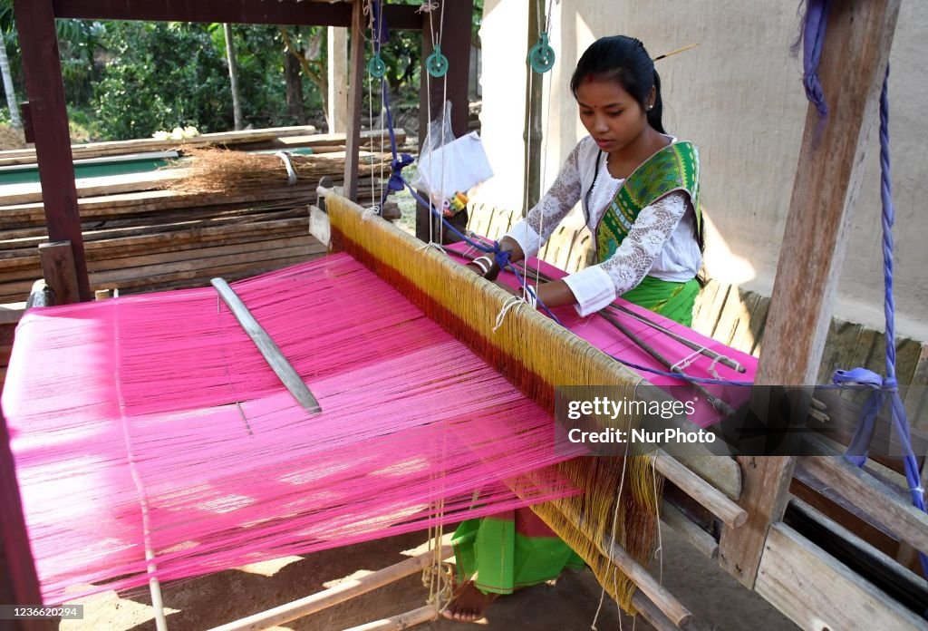 A Women Weaving Bodo Traditional Dress Dokhona In Kokrajhar District a-women-weaving-bodo-traditional-dress-dokhona-in-kokrajhar-district