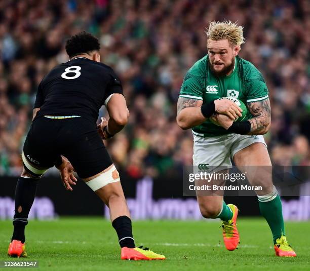 Dublin , Ireland - 13 November 2021; Andrew Porter of Ireland in action against Ardie Savea of New Zealand during the Autumn Nations Series match...