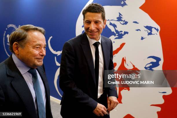 Newly elected President of "France's Mayors' Association" and Cannes' mayor David Lisnard walks next to his Vice-President and Issoudun's mayor Andre...