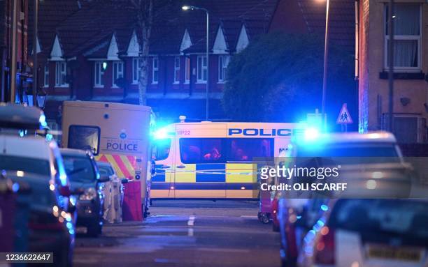 Police van is pictured at a cordon near a residential property, as members of the Army bomb disposal unit work on Sutcliffe Street, in Liverpool on...