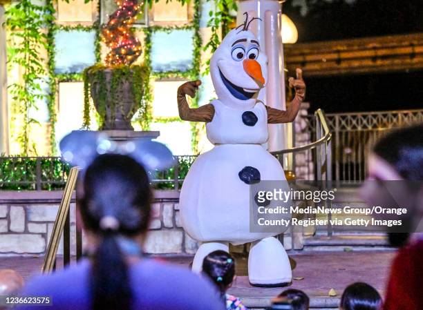 Anaheim, CA Olaf, from Frozen, greets visitors in Fantasyland during Disney Merriest Nites at Disneyland in Anaheim, CA, on Tuesday, November 16,...