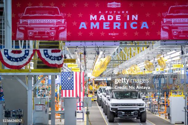 General view of GMC Hummer EVs is pictured on November 17, 2021 at General Motors' Factory ZERO electric vehicle assembly plant in Detroit, Michigan....