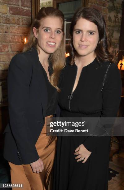 Princess Beatrice of York and Princess Eugenie of York attend an intimate dinner hosted by Sofia Blunt to launch the Loci vegan sneaker in aid of...