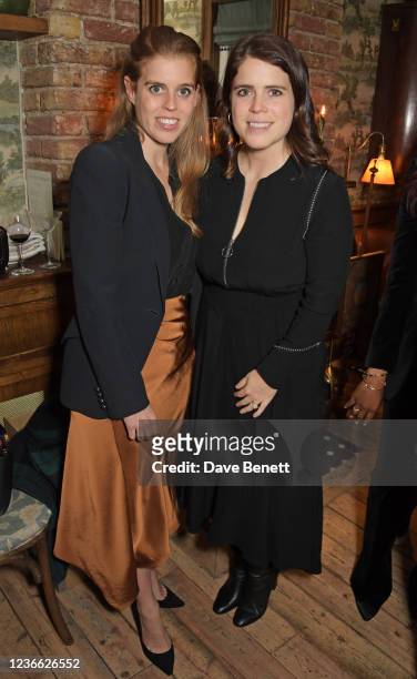 Princess Beatrice of York and Princess Eugenie of York attend an intimate dinner hosted by Sofia Blunt to launch the Loci vegan sneaker in aid of...