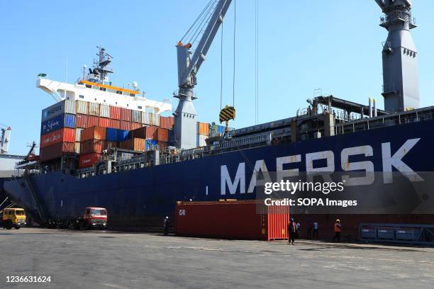 View of a ship with containers on top at Chittagong Port. Chittagong Port on the banks of the Karnaphuli river is Bangladesh's main seaport.