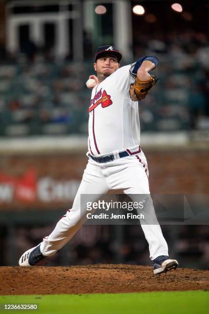 Luke Jackson of the Atlanta Braves pitches during Game 1 of the NLCS between the Los Angeles Dodgers and the Atlanta Braves at Truist Park on...